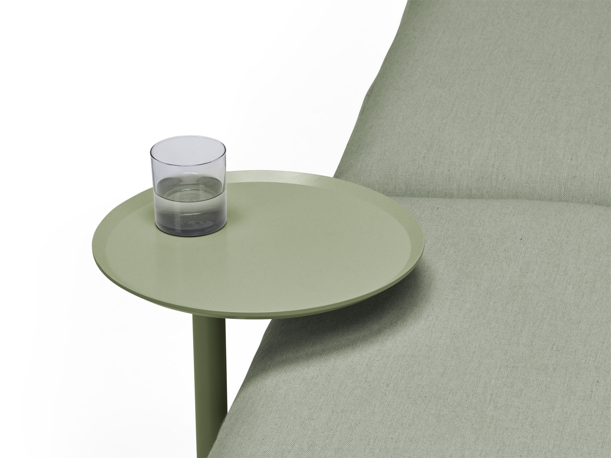 Detail view of green metal outdoor side table